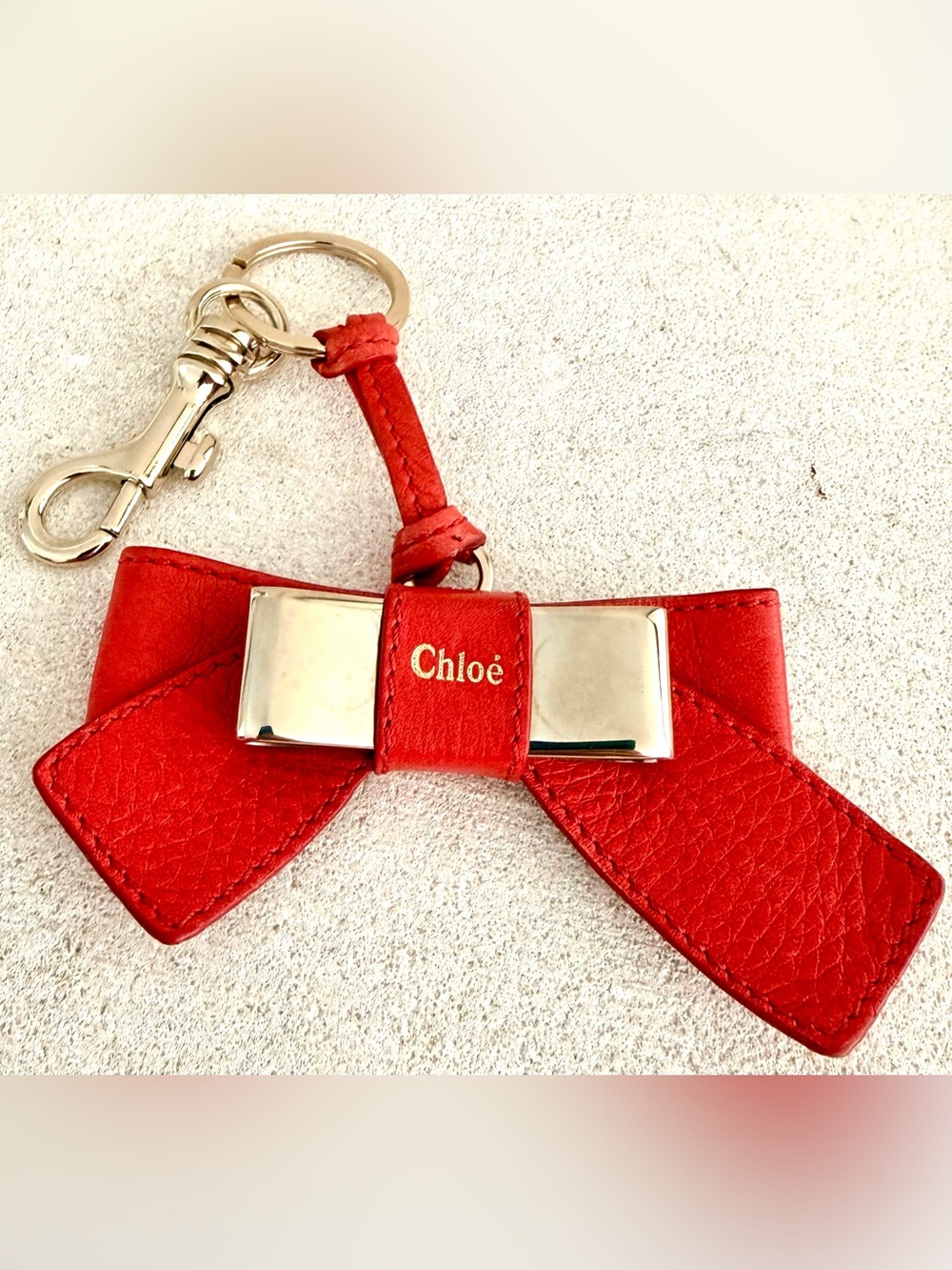 CHLOÉ Red Leather Bow Bag Charm Keychain Silver Tone Designer